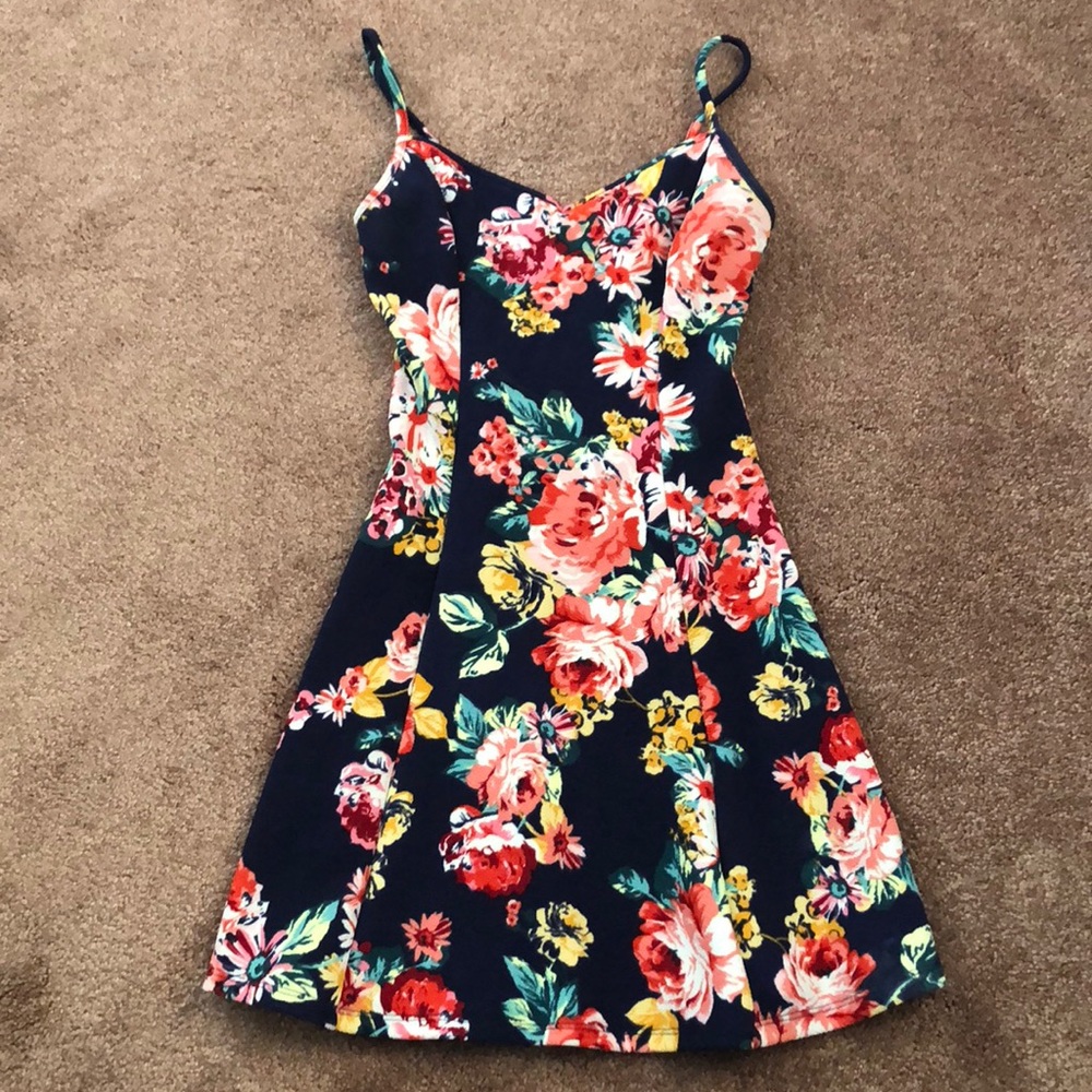 Tunic top- navy blue with floral designs. Size S